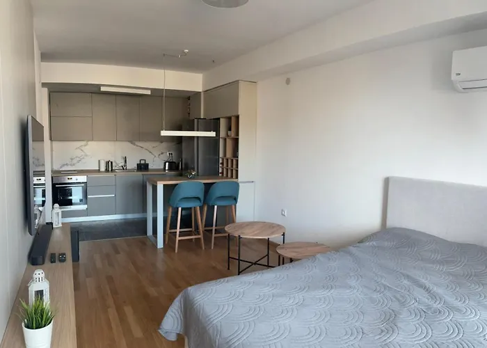 Апартаменты Cozy In The Heart Of